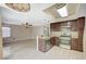 Kitchen with stainless steel appliances, granite countertops, and an open view to living room at 5609 Indian Ridge Dr, North Las Vegas, NV 89031