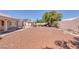 Spacious backyard with low-maintenance desert landscaping, gazebo and patio cover at 5808 Spinnaker Reach Ave, Las Vegas, NV 89130