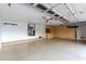 The garage features built in cabinets, epoxy flooring, and a garage door opener at 6779 Rainstorm Ridge Ave, Las Vegas, NV 89131
