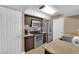 Functional kitchen with stainless steel appliances, tiled backsplash, and efficient layout at 6800 E Lake Mead Blvd # 2089, Las Vegas, NV 89156