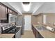 Well-lit kitchen featuring modern appliances and countertops, ideal for cooking and entertaining at 6800 E Lake Mead Blvd # 2089, Las Vegas, NV 89156