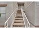 Exterior stairwell to the unit, providing access to upper-level residences at 6800 E Lake Mead Blvd # 2089, Las Vegas, NV 89156