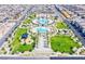 An aerial perspective of the community's amenity center and green space surrounded by houses at 6807 Satin Silver Ct, North Las Vegas, NV 89086
