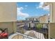 Cozy balcony view showcasing outdoor seating and neighborhood scenery on a bright, sunny day at 6807 Satin Silver Ct, North Las Vegas, NV 89086