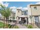 Attractive townhome featuring a private patio area with a gazebo, perfect for enjoying outdoor living and relaxation at 6807 Satin Silver Ct, North Las Vegas, NV 89086