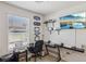 Office space featuring natural light, desk, and display shelves at 6807 Satin Silver Ct, North Las Vegas, NV 89086