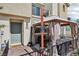 View of townhome's cozy front patio, complete with a gazebo, seating, and stylish decor for outdoor enjoyment at 6807 Satin Silver Ct, North Las Vegas, NV 89086