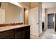 Bathroom with dark cabinets and a light countertop at 741 Flowing Meadow Dr, Henderson, NV 89014