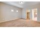 Neutral bedroom with standard carpet flooring, and small windows at 741 Flowing Meadow Dr, Henderson, NV 89014