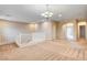 Loft space overlooking the stairs with neutral carpet and lots of natural light at 741 Flowing Meadow Dr, Henderson, NV 89014