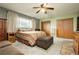 Spacious bedroom with a ceiling fan, natural light and lots of closet space at 7701 Pheasant Ln, Las Vegas, NV 89145