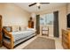 Cozy bedroom featuring a daybed and natural light from the window at 7701 Pheasant Ln, Las Vegas, NV 89145