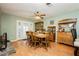 Inviting dining room featuring a wood table, chairs and matching cabinetry at 7701 Pheasant Ln, Las Vegas, NV 89145