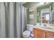Bathroom with neutral walls, single sink, and shower with curtain at 7961 Lions Rock Way # 202, Las Vegas, NV 89128