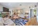 Relaxing living room with a cozy fireplace, stylish decor, and an open layout for entertaining at 7961 Lions Rock Way # 202, Las Vegas, NV 89128
