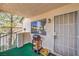 Outdoor patio area with a grill, secure door, and outdoor space perfect for relaxing at 7961 Lions Rock Way # 202, Las Vegas, NV 89128