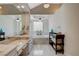 Bathroom with marble floors, dual vanities, soaking tub, and natural light at 7988 Pinnacle Peak Ave, Las Vegas, NV 89113