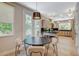 Dining area leading to kitchen with modern fixtures and finishes at 7988 Pinnacle Peak Ave, Las Vegas, NV 89113
