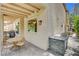 Outdoor patio with dining area, built-in grill, and covered seating, ideal for entertaining and enjoying outdoor meals at 7988 Pinnacle Peak Ave, Las Vegas, NV 89113