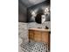 Stylish powder room featuring a decorative vanity, mirror, and modern lighting at 7988 Pinnacle Peak Ave, Las Vegas, NV 89113
