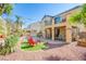 Beautiful outdoor space showcasing pool, dining area, and mature landscaping at 8029 Flambeau St, Las Vegas, NV 89131