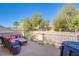Relaxing balcony with outdoor seating and a view of the neighborhood's mature trees at 8029 Flambeau St, Las Vegas, NV 89131