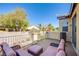 Inviting outdoor balcony featuring comfortable seating with neighborhood views and desert landscaping at 8029 Flambeau St, Las Vegas, NV 89131