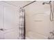 Bathroom with a tub and shower combination, a white shower curtain, and fixtures at 8029 Flambeau St, Las Vegas, NV 89131