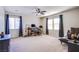 Spacious bonus room with large windows, neutral carpet, and versatile living area at 8029 Flambeau St, Las Vegas, NV 89131