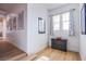 Bright hallway features modern art and stylish decor by a sunlit window at 8029 Flambeau St, Las Vegas, NV 89131