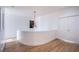 Well-lit hallway with curved wall and double doors offers a clean, modern aesthetic at 8029 Flambeau St, Las Vegas, NV 89131