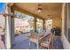 Outdoor patio area with dining table, chairs, and decorative lighting at 8029 Flambeau St, Las Vegas, NV 89131