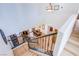 Stylish staircase showcasing the dining room below, enhanced by natural light at 8029 Flambeau St, Las Vegas, NV 89131
