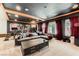 Finished basement featuring recessed lighting, exercise equipment, and a large sectional couch at 8121 Russell Creek Ct, Las Vegas, NV 89139
