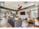 Cozy living room featuring modern decor, hardwood floors, and comfortable seating at 8121 Russell Creek Ct, Las Vegas, NV 89139