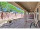 Covered patio with gravel and a fire pit offers outdoor relaxation and entertainment at 8121 Russell Creek Ct, Las Vegas, NV 89139