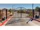 Ornate community gate welcoming residents and guests at 8223 Saddleback Ledge Ave, Las Vegas, NV 89147