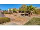 Community park with picnic tables, BBQ grills, and lush trees at 8223 Saddleback Ledge Ave, Las Vegas, NV 89147