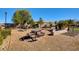 Park features picnic tables with games, seating areas, and barbeque grills at 8223 Saddleback Ledge Ave, Las Vegas, NV 89147