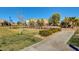 Community park offers grassy areas, walking paths, and lots of greenery at 8223 Saddleback Ledge Ave, Las Vegas, NV 89147