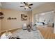 Spacious living room showcasing hardwood floors, contemporary décor, and seamless transition to the bedroom at 8223 Saddleback Ledge Ave, Las Vegas, NV 89147