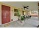 Covered patio with seating area offers an ideal space for outdoor relaxation and entertainment at 8223 Saddleback Ledge Ave, Las Vegas, NV 89147