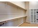 Well-organized walk-in closet with custom shelving and ample storage space at 8223 Saddleback Ledge Ave, Las Vegas, NV 89147
