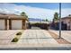 Charming home featuring a two-car garage, gated driveway, and mountain views at 854 Santa Maria Way, Mesquite, NV 89027