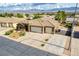 This home features an attached two-car garage and a long driveway at 854 Santa Maria Way, Mesquite, NV 89027