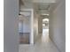 Inviting hallway with tile flooring, archway and decorative ceiling features at 854 Santa Maria Way, Mesquite, NV 89027