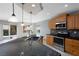 Kitchen featuring stainless steel appliances, a tile backsplash, and views of the backyard at 854 Santa Maria Way, Mesquite, NV 89027