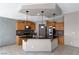 Modern kitchen with island, stainless steel appliances, and ample cabinet space at 854 Santa Maria Way, Mesquite, NV 89027