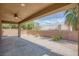 Covered patio for outdoor entertaining with a ceiling fan at 854 Santa Maria Way, Mesquite, NV 89027