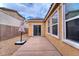 Cozy backyard with patio and low-maintenance gravel landscaping at 8560 Osmerea Ct, Las Vegas, NV 89149
